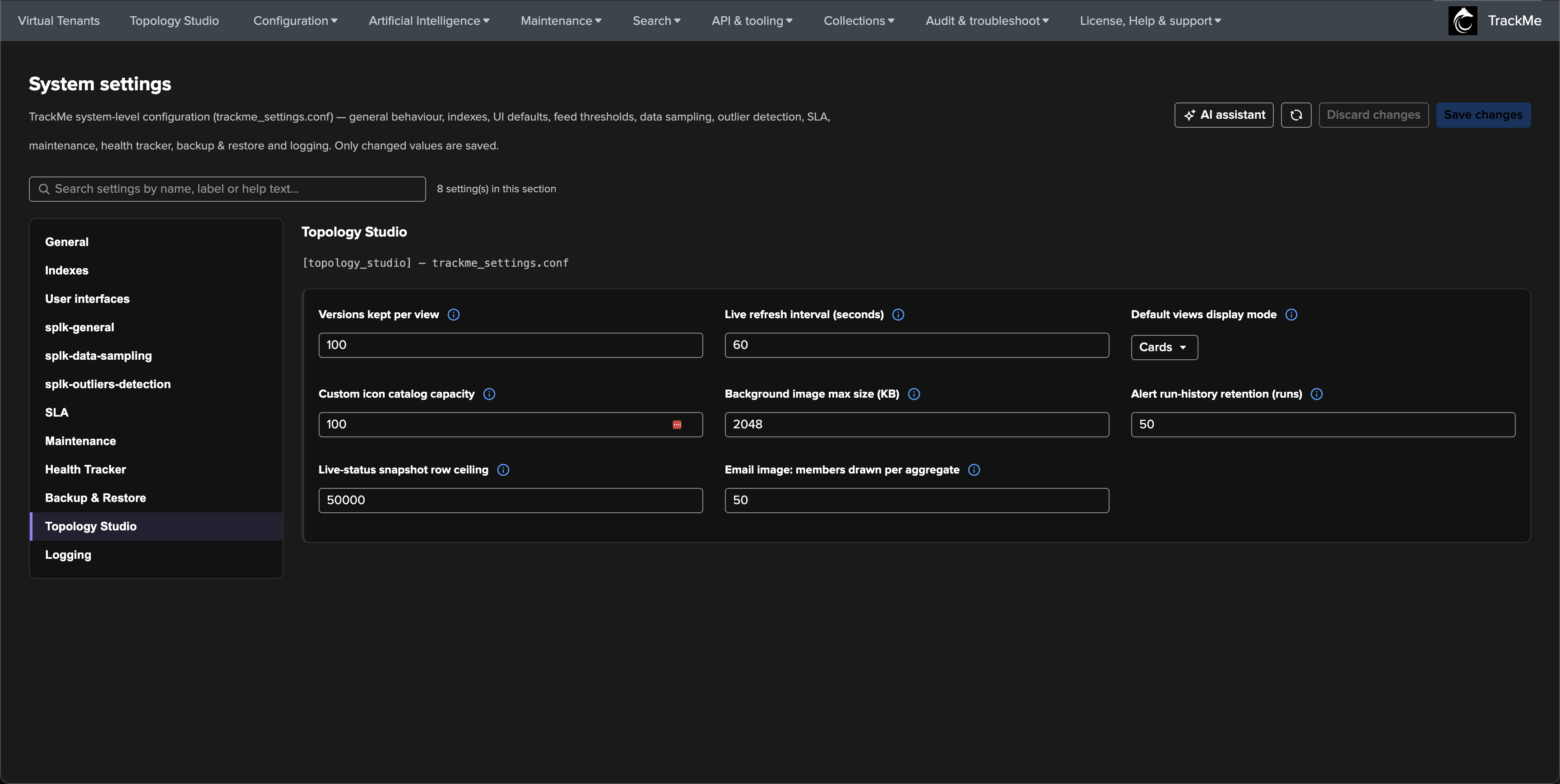 The System settings page on the Topology Studio section with the eight deployment-wide settings, including Default views display mode and the email image members ceiling